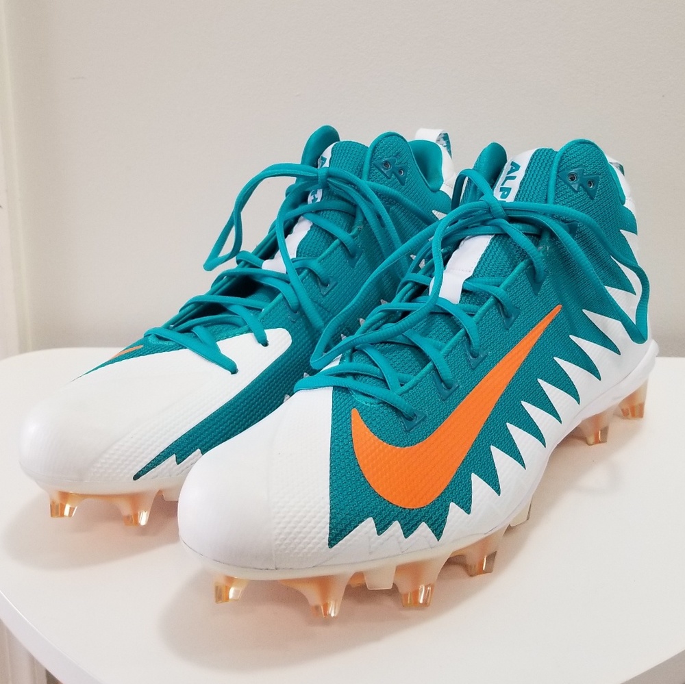 NWOT Nike Men's Teal and Orange Cleats